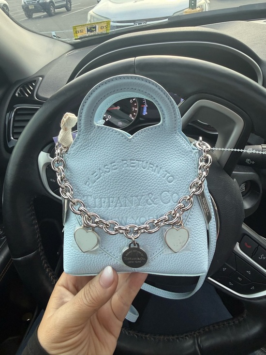 Tiffany & Co. Handbags - Tiffany & Co. Light Blue Pebbled Mini Tote with Heart Charm Chain